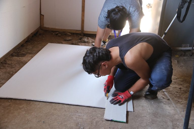 25 familias de Vicuña mejoraron sus viviendas gracias al  trabajo de estudiantes voluntarios de Santo Tomás